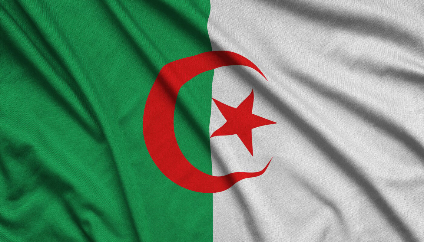 Algeria flag is depicted on a sports cloth fabric with many folds. Sport team waving banner