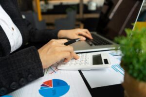 Businesswoman accountant or female finance making calculations. Savings, Business Financing Accounti