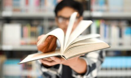 Close-up of hand flipping the book