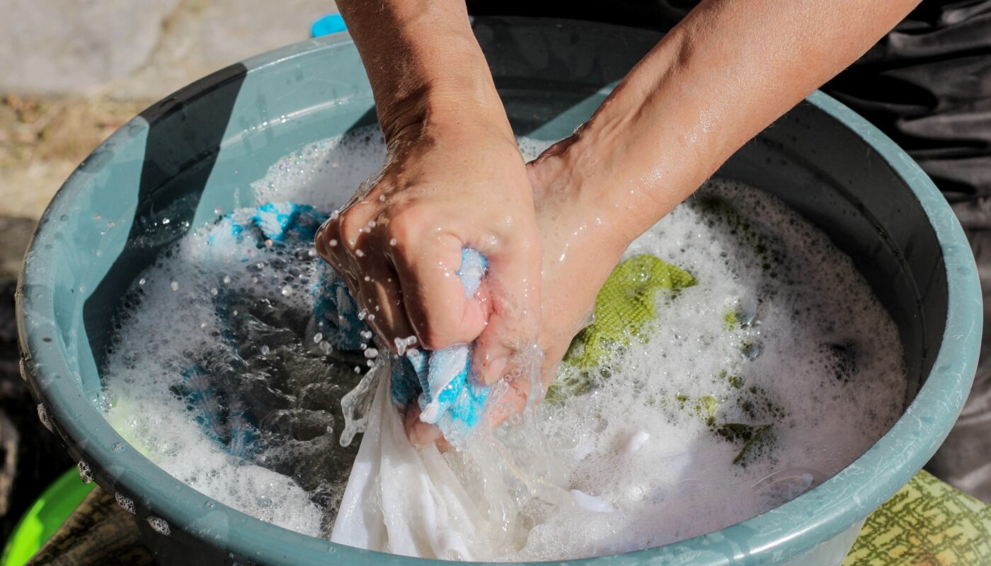 Hands washing clothes in a lungs