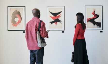 Observing Artwork in Modern Art Gallery Exhibit
