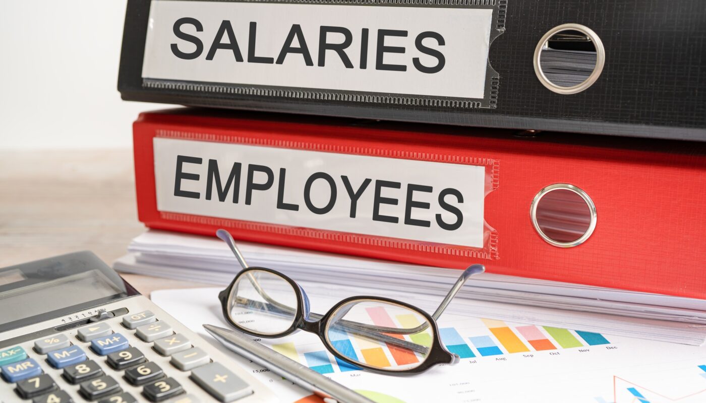 Salaries Employees. Binder data finance report business with graph analysis in office.