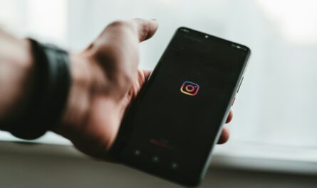 person holding black android smartphone
